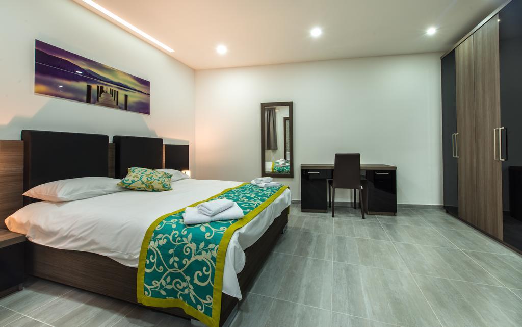 Hacienda Apartments Слима Экстерьер фото