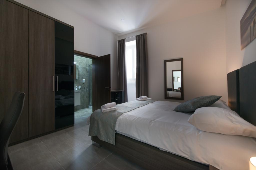 Hacienda Apartments Слима Экстерьер фото